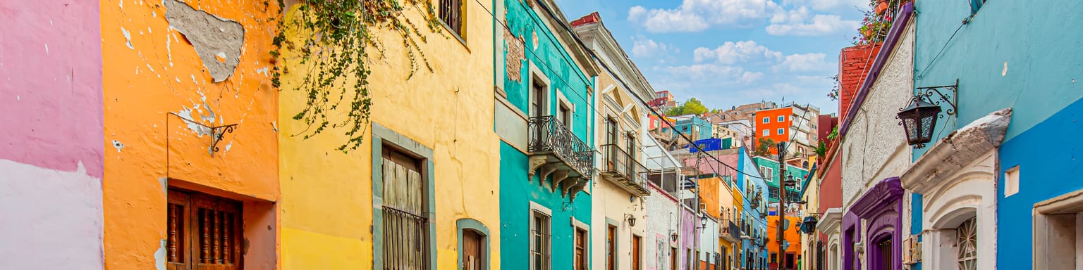 Colourful buildings lining a street in Guanajuato City, Mexico.
