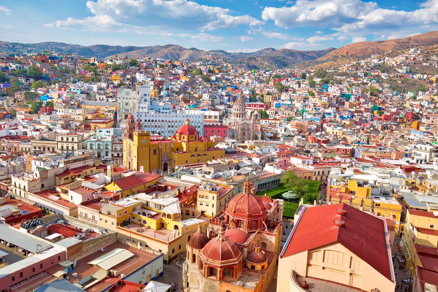 A view of Guanajuato's colourful buildings and historic churches from the top of a funincular.