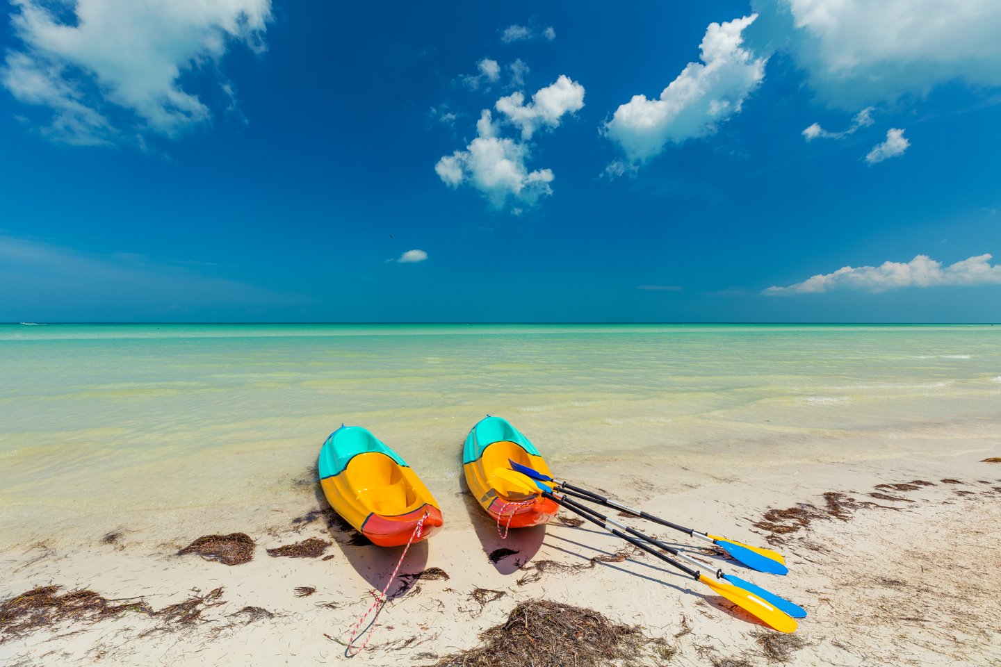 Colourful kayaks on the beach in Holbox, Mexico