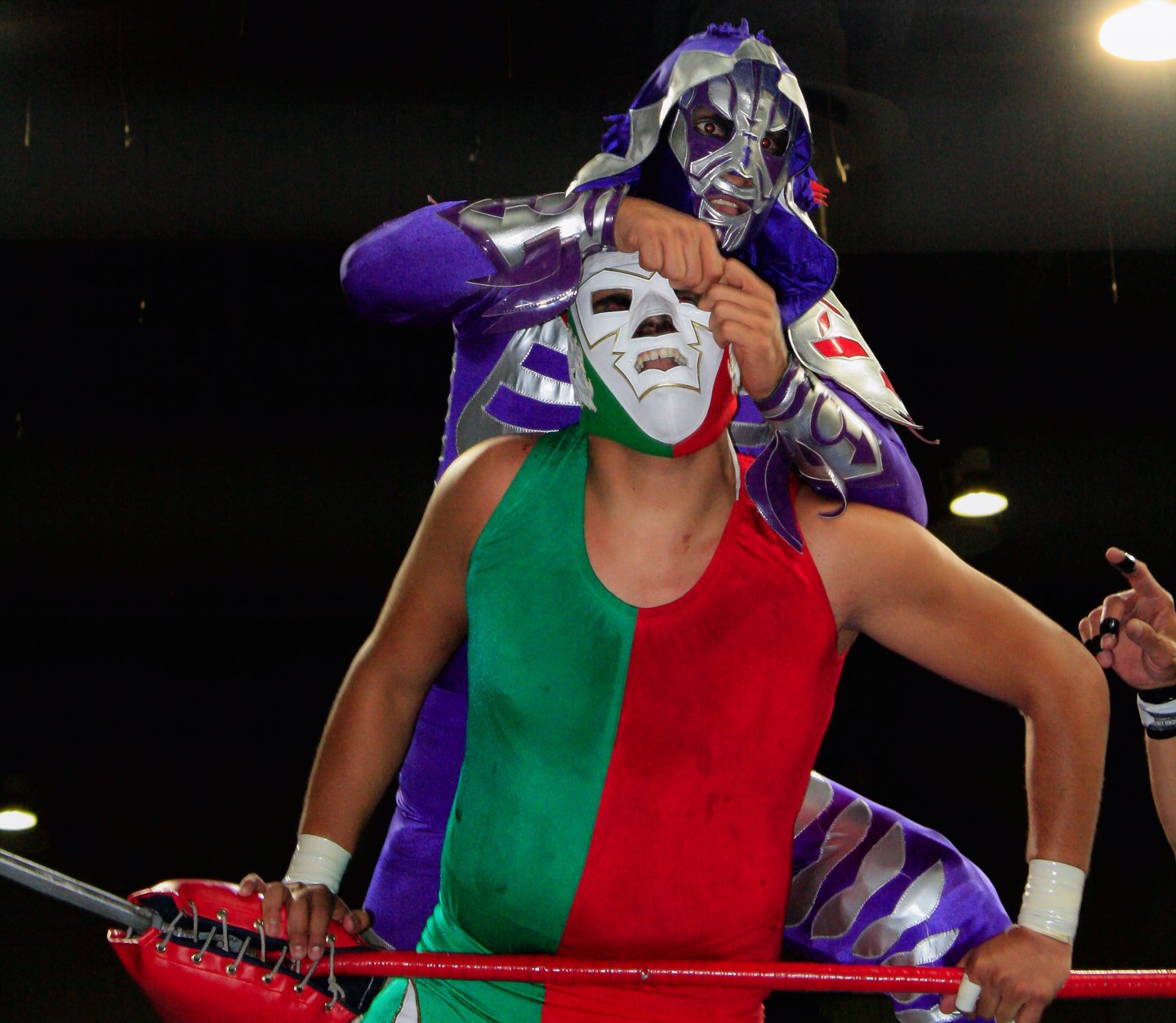 Trying to pull off an opponents mask 