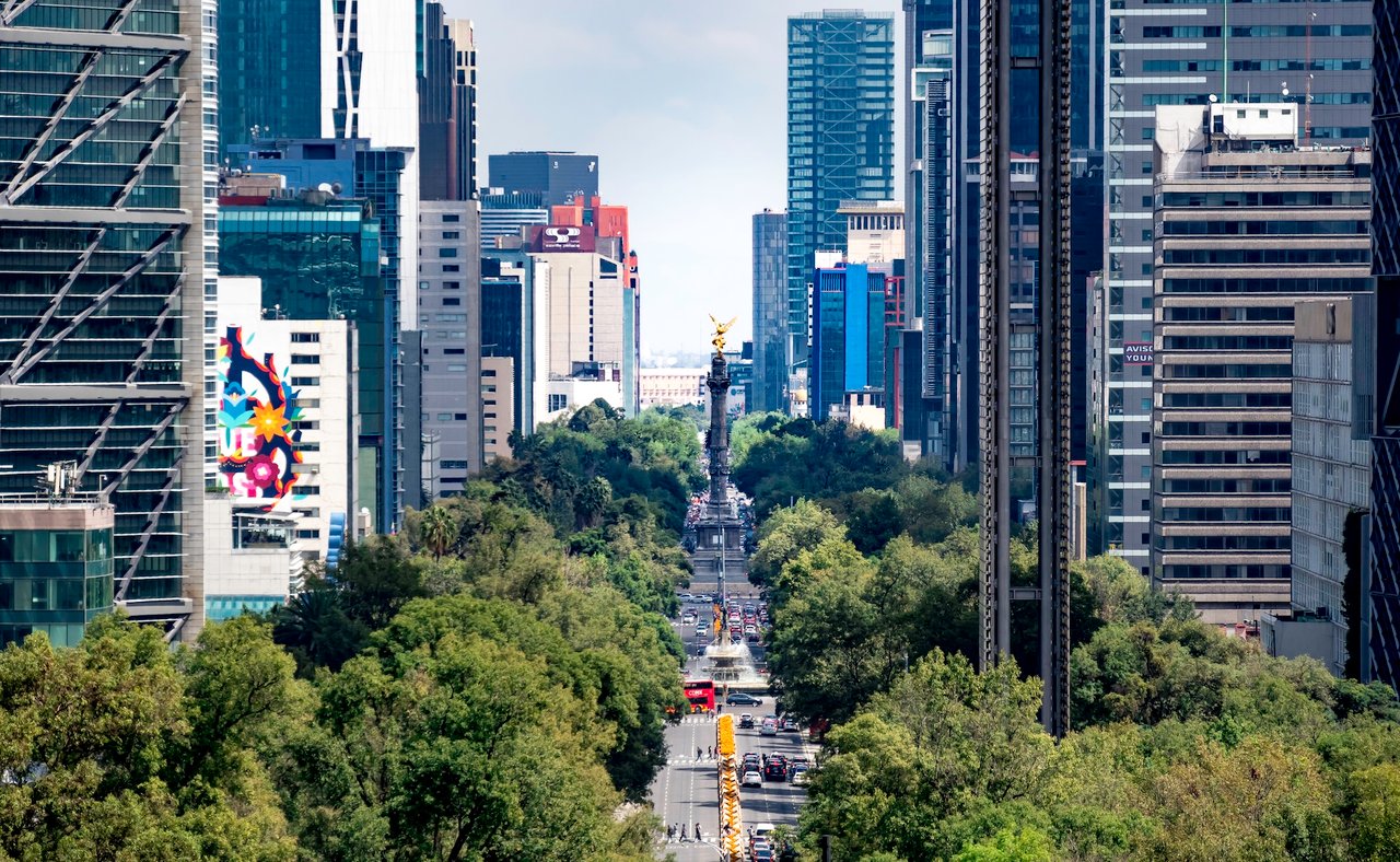 View of Paseo de la Reforma nested between skyscrapers in Mexico City