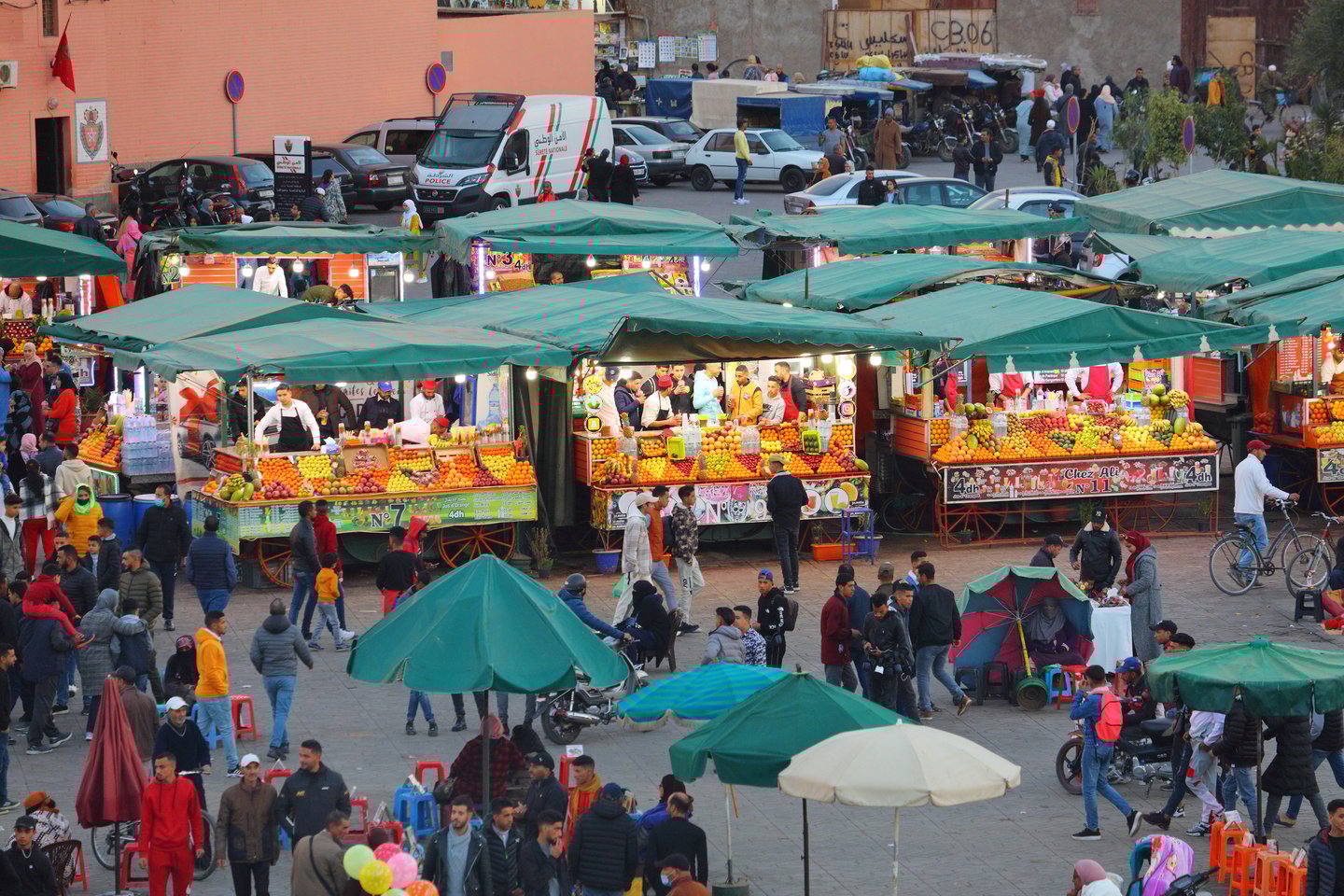 People visit Jamaa el-Fnaa square market of Marrakech city, Morocco.