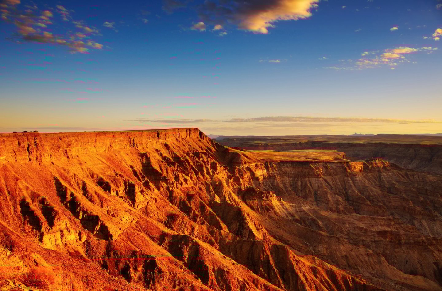 The walls of the Fish River Canyon turning red at sunset