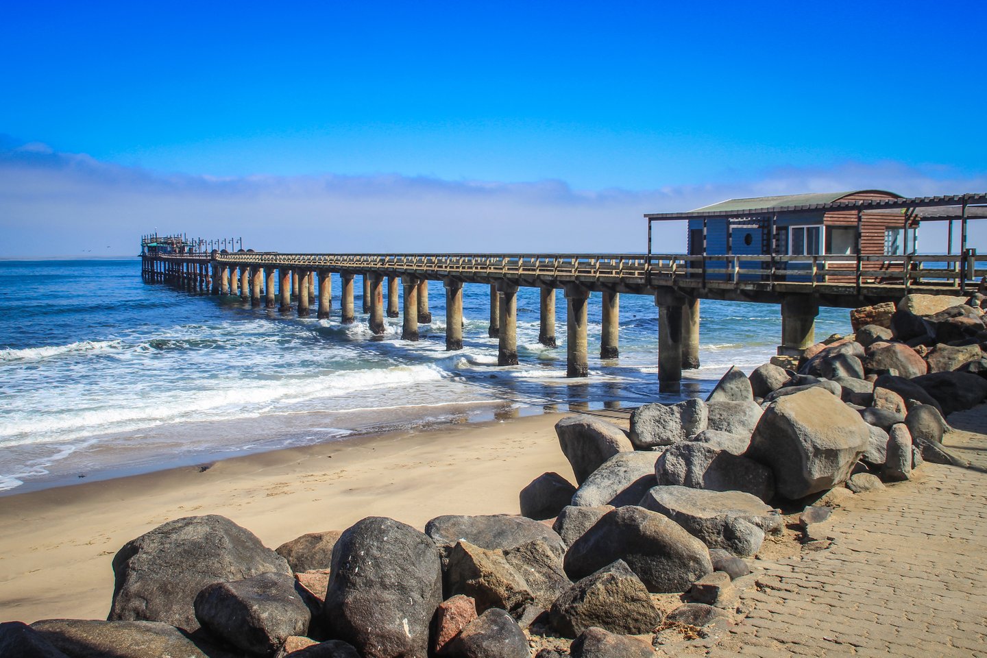 A wharf stretching into the sea at Swakopmund, Namibia