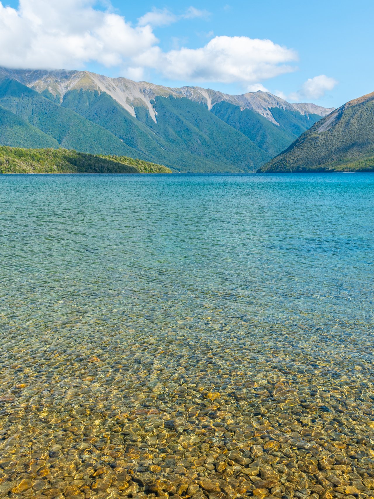 The clear waters of Lake Rotoiti on a sunny day 