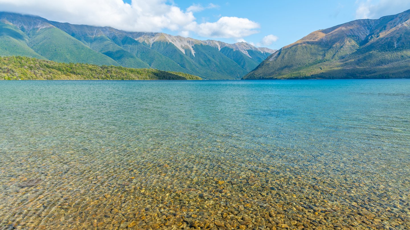 The clear waters of Lake Rotoiti on a sunny day 