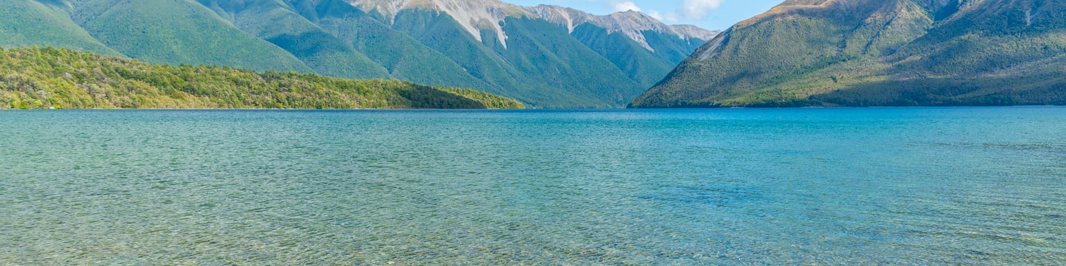 The clear waters of Lake Rotoiti on a sunny day 