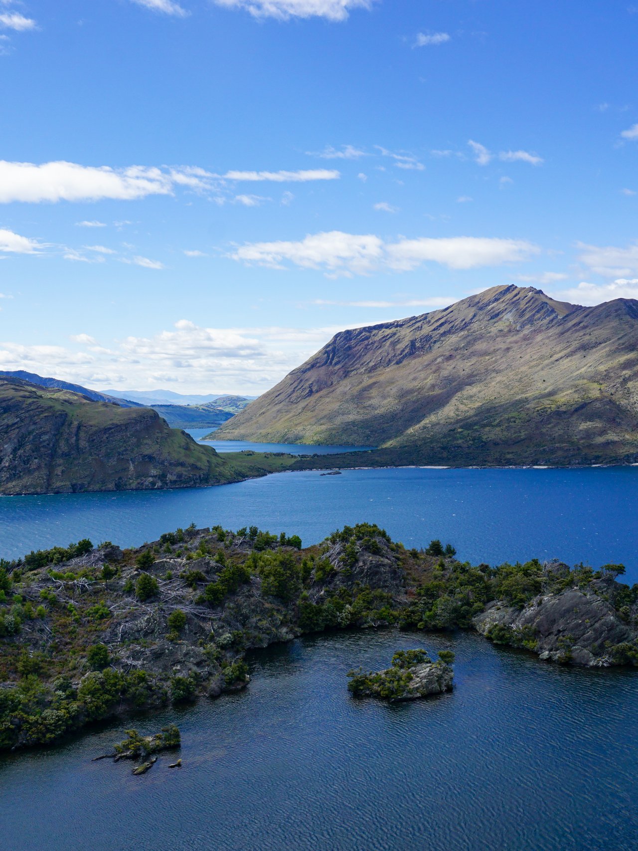 Looking down at the lakes and islands from the viewpoint of Mou Waho island, New Zealand