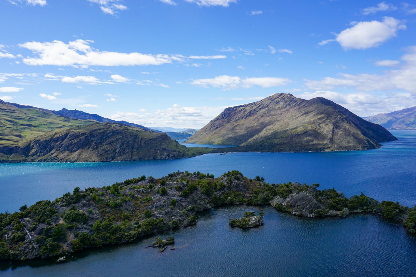 Looking down at the lakes and islands from the viewpoint of Mou Waho island, New Zealand