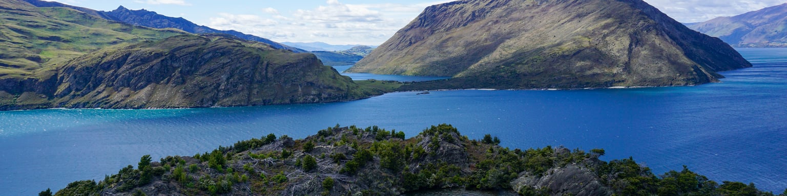 Looking down at the lakes and islands from the viewpoint of Mou Waho island, New Zealand