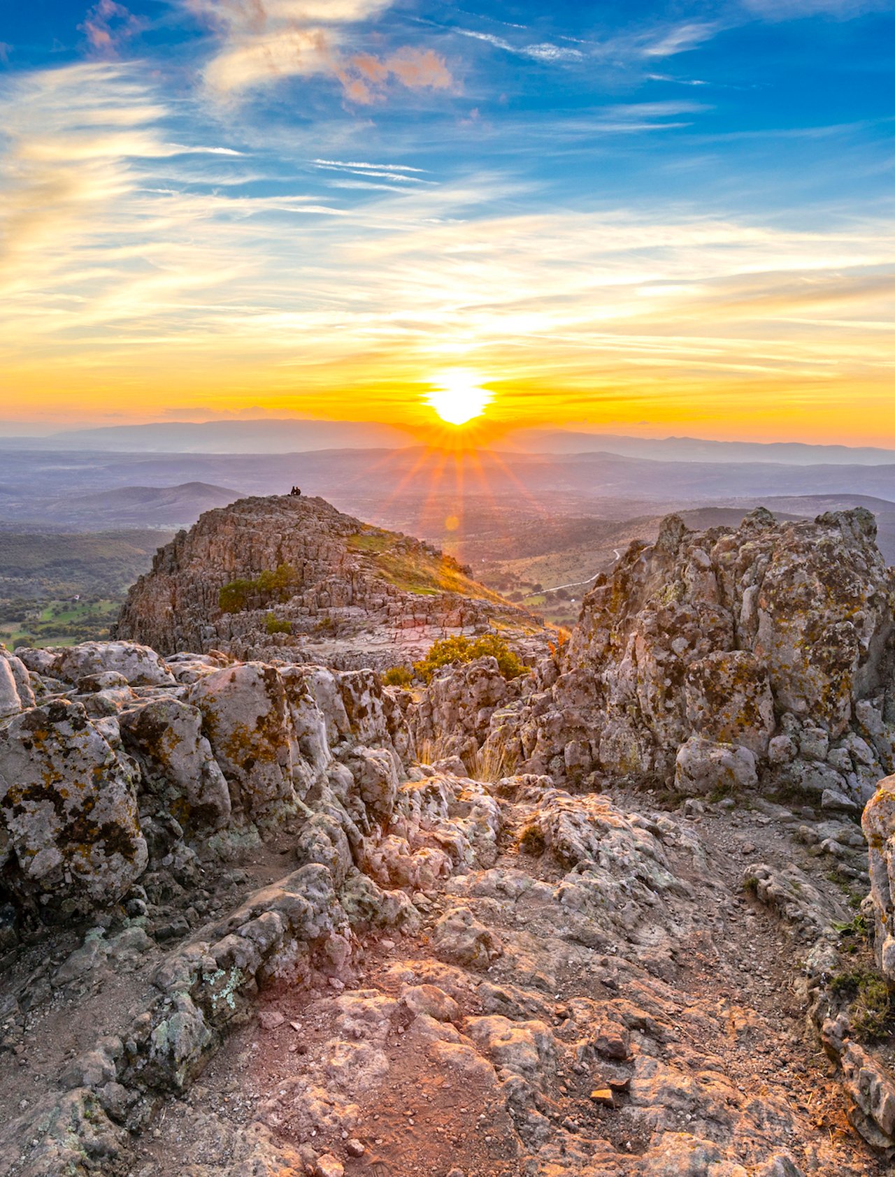 The sun setting over the ancient site of the Kokino Observatory in North Macedonia