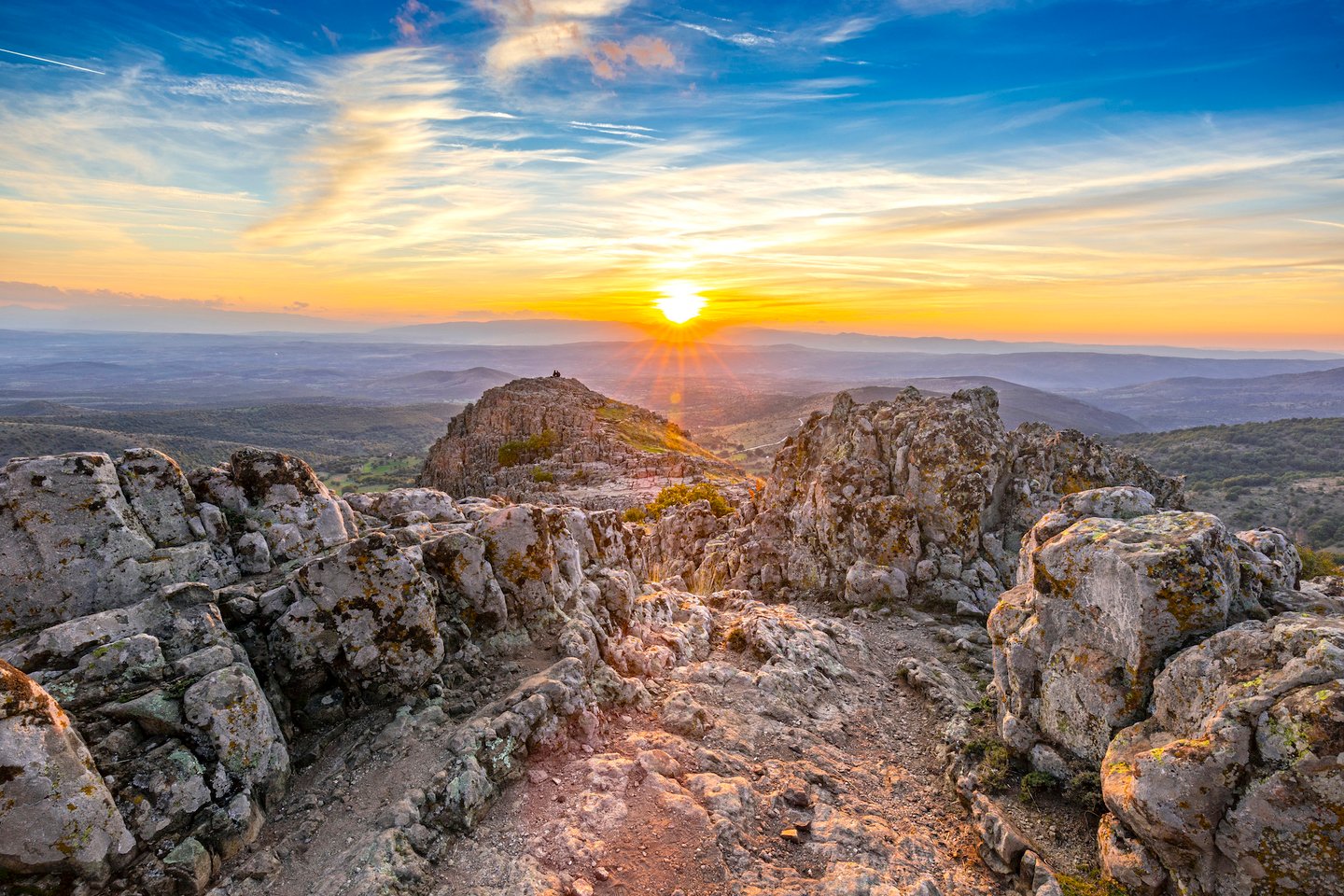 The sun setting over the ancient site of the Kokino Observatory in North Macedonia