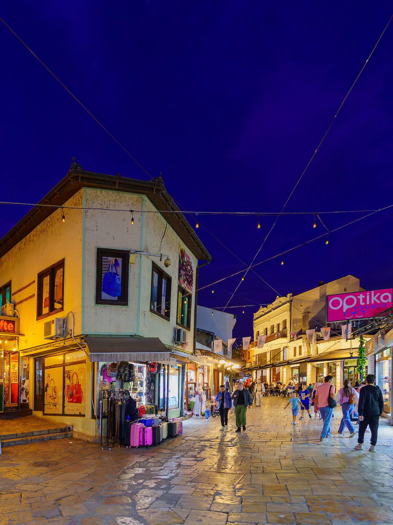 People shopping in Skopje in the evening.