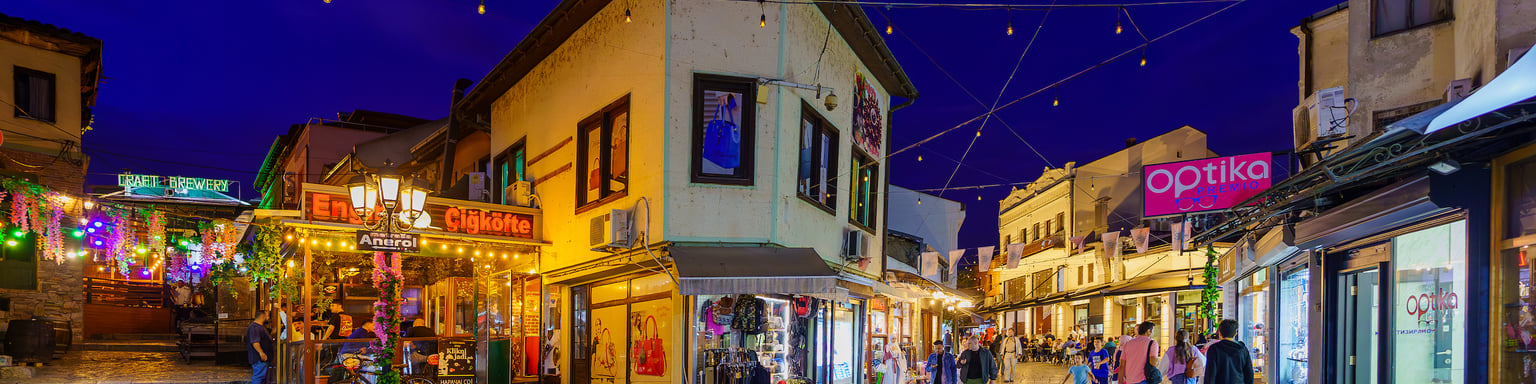People shopping in Skopje in the evening.