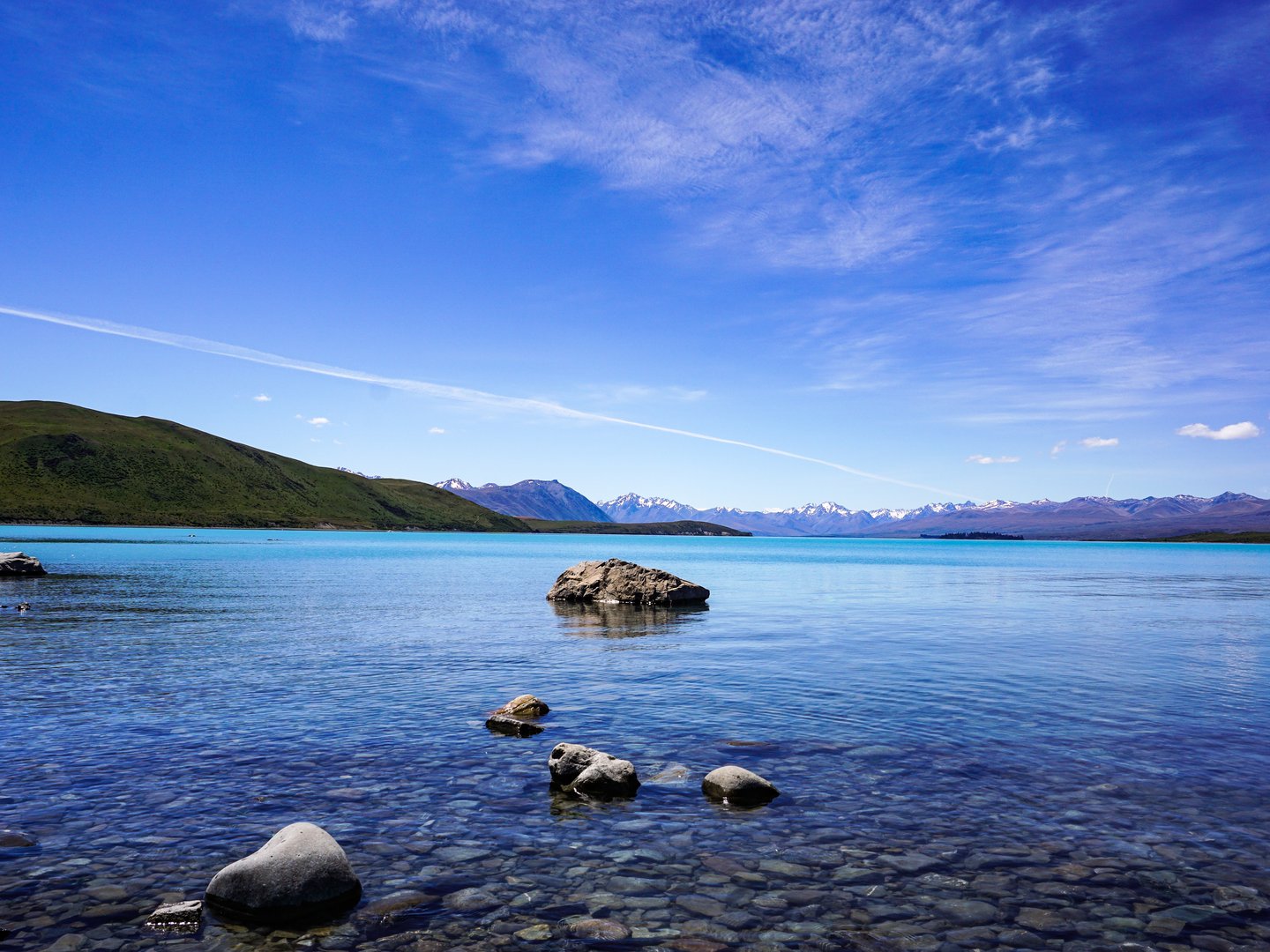 Looking through water to the stones at the bottom of the lake