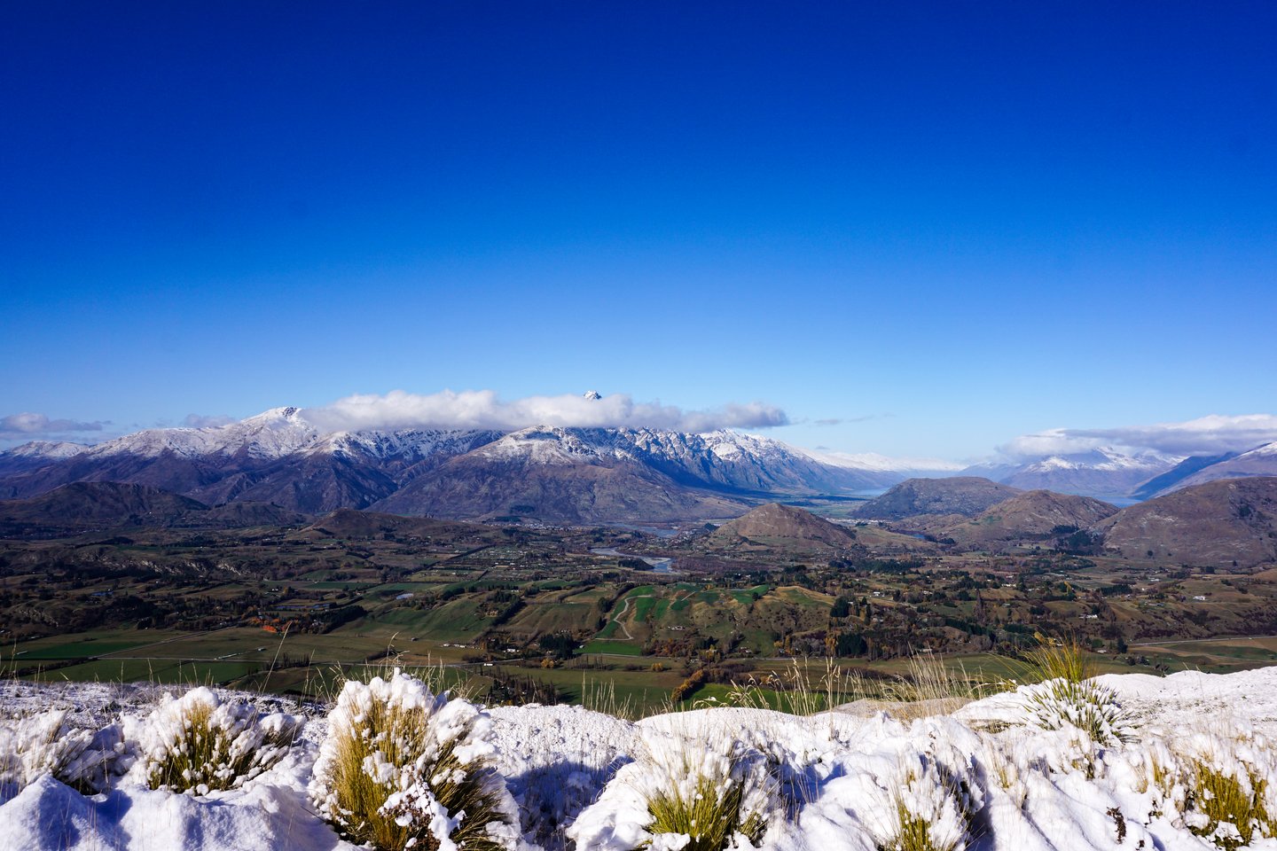 View from Coronet peak with snow in foreground