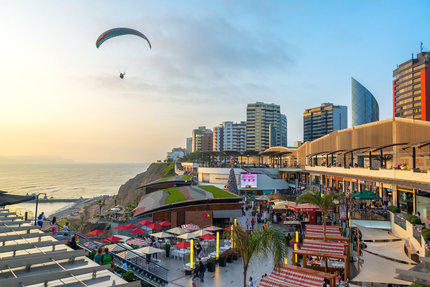 A paraglider floating over Lima, Peru