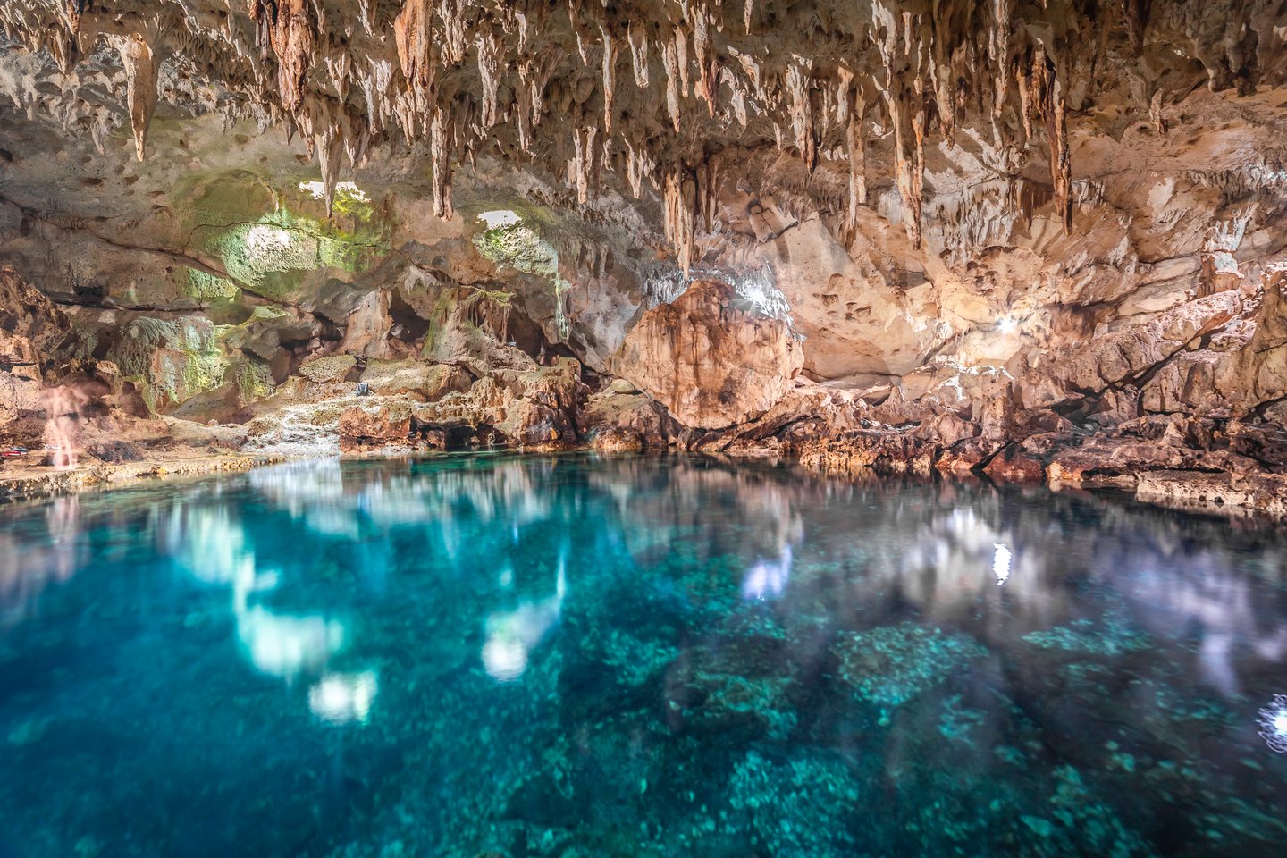 The beautiful waters of Hinagdanan Cave in the Philippines