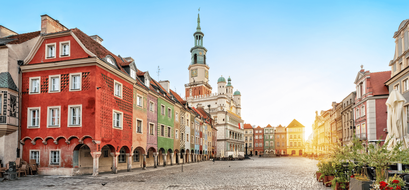 Rynek square with small colorful houses and old Town Hall in Poznan, Poland