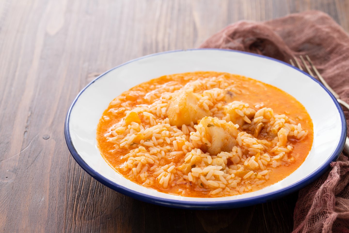 Arroz de tamboril, monkfish in tomato and rice