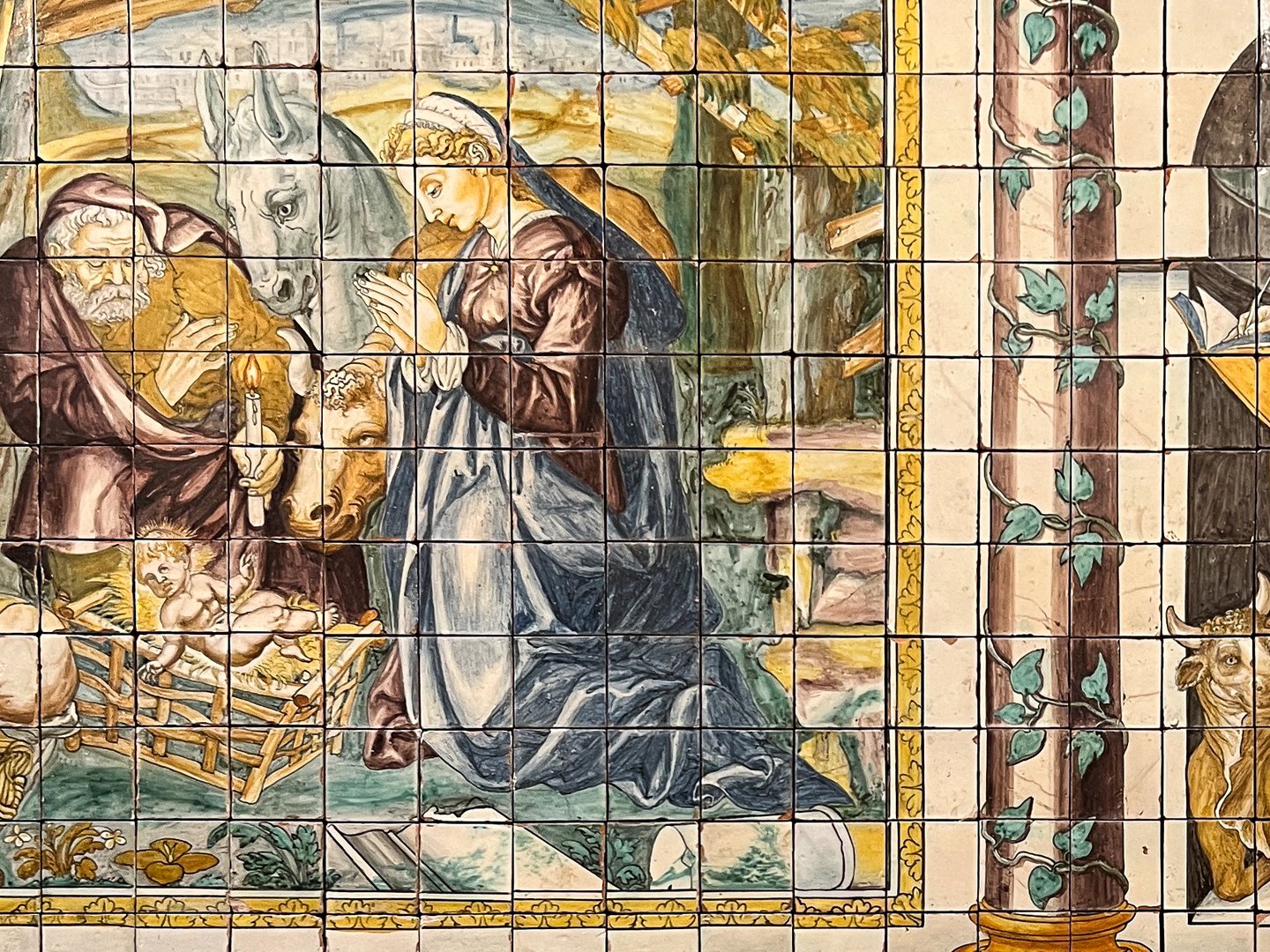 A wall decorated with tiles in the National Tile Museum