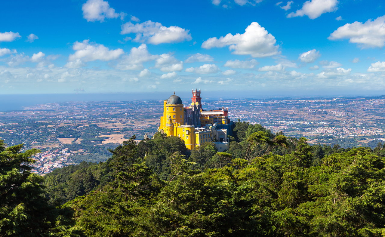 Pena Palace perched on top of a hill in Sintra, Portugal