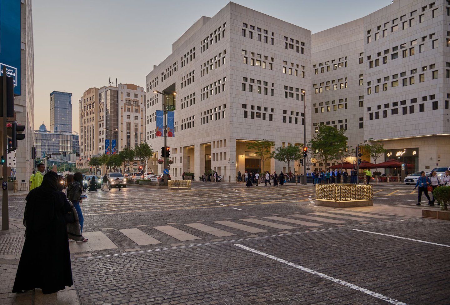 People and cars in the Msheireb area of Downtown Doha, Qatar