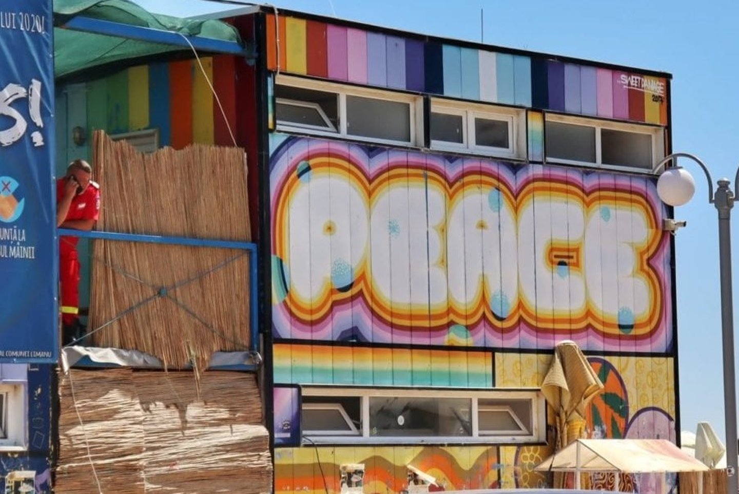 "Peace" street art in Vama Veche
