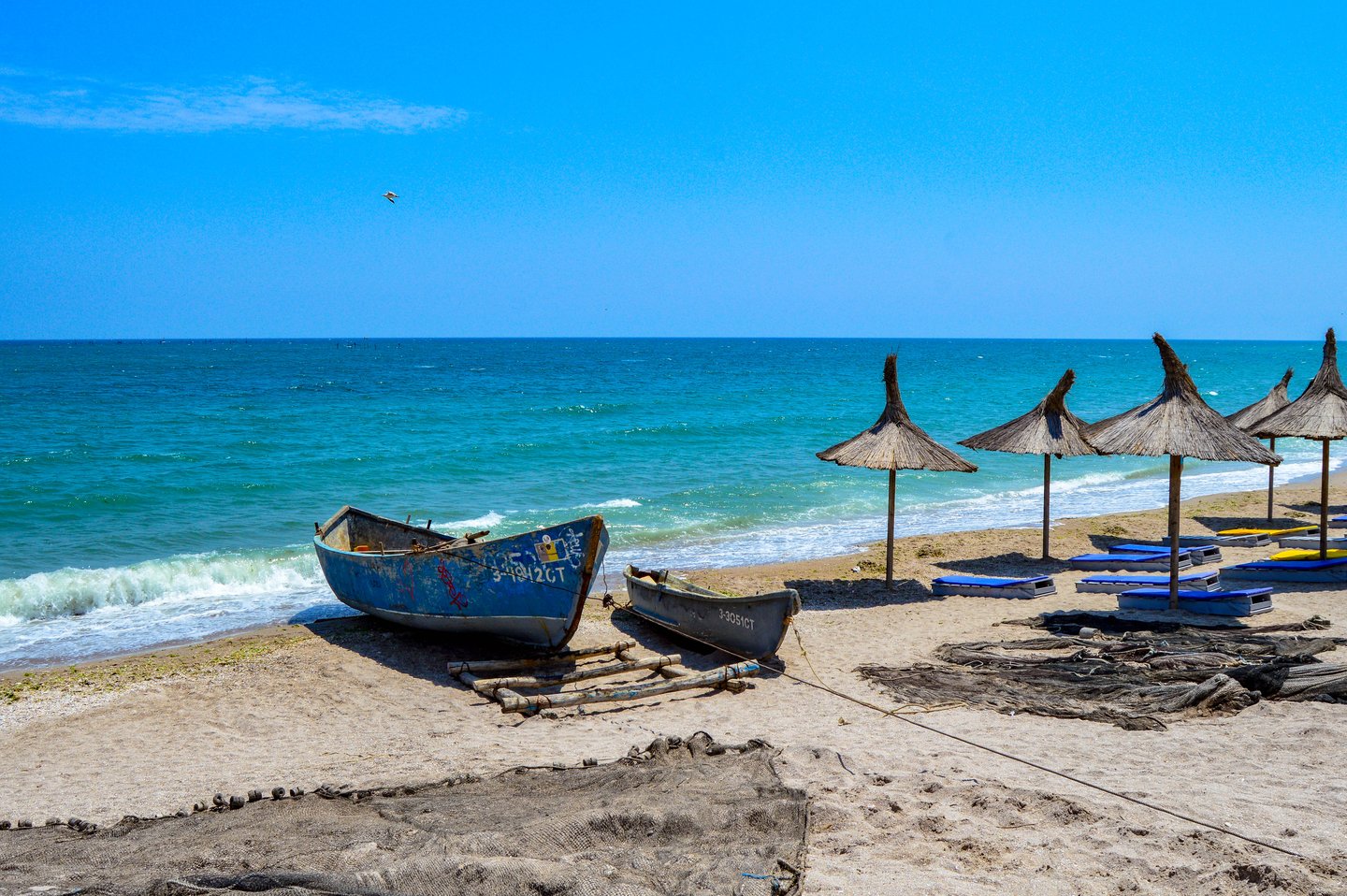 Row boats on the beach at Vama Veche
