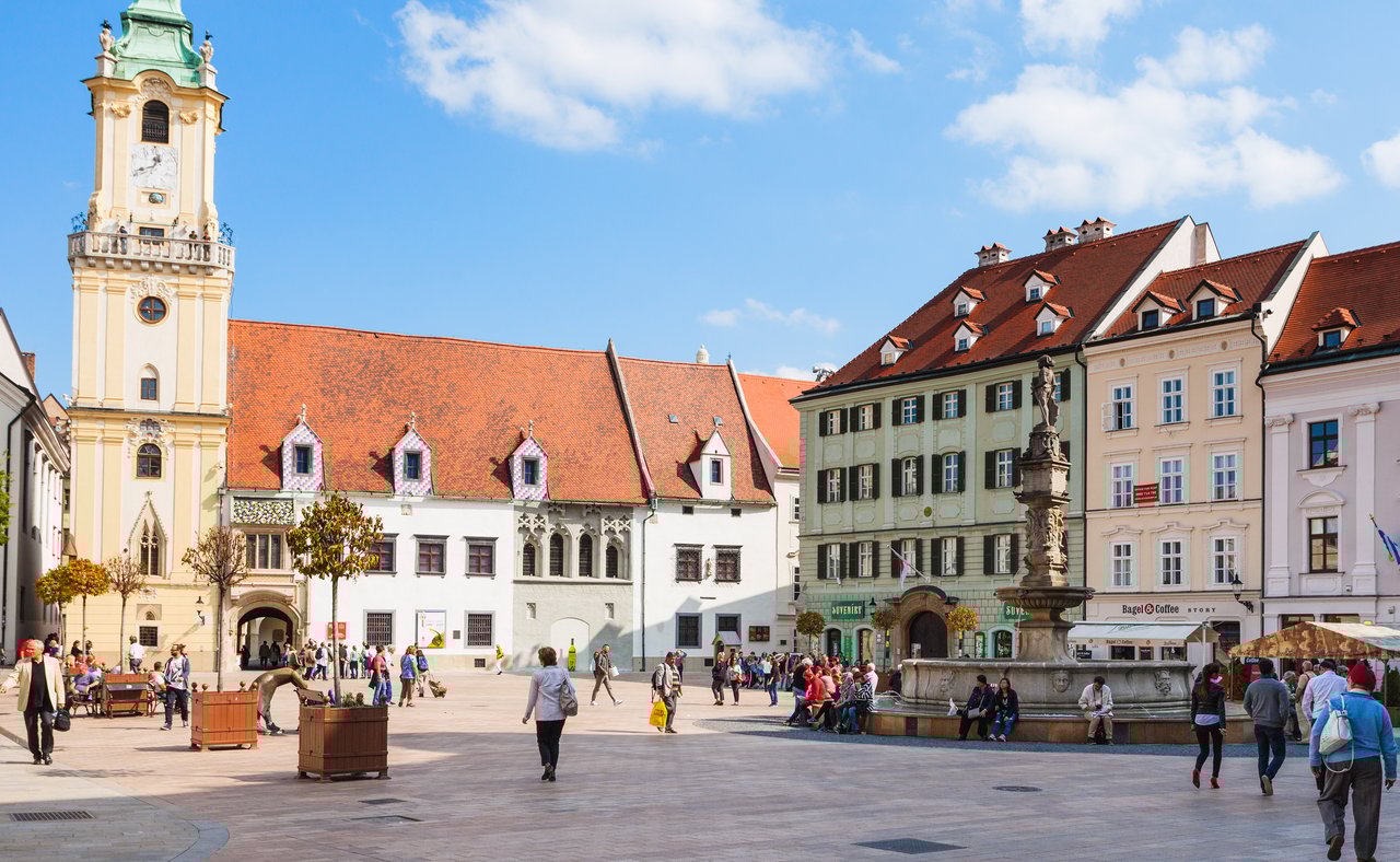 People milling around the Main Square in Bratislava, Slovakia