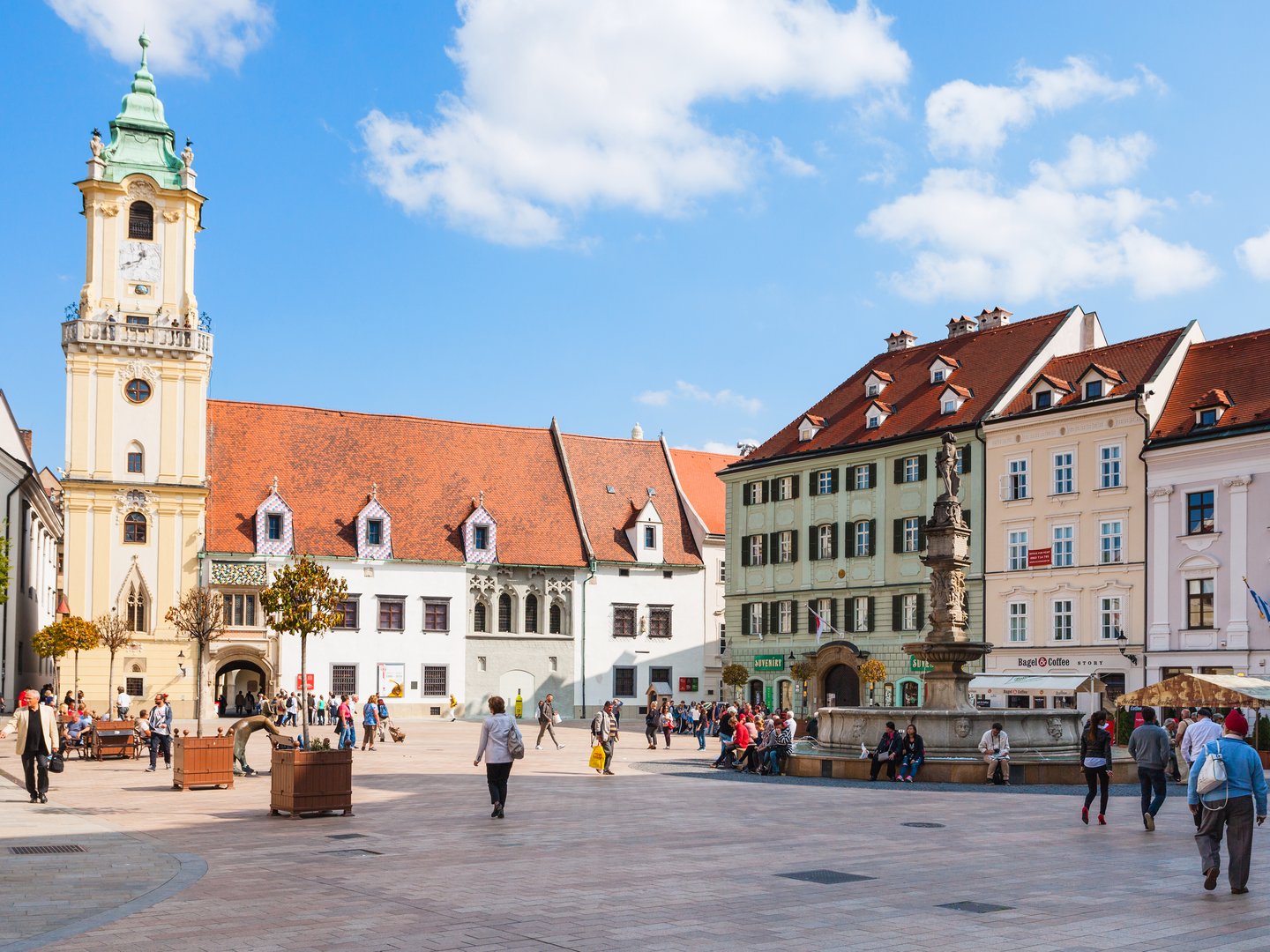People milling around the Main Square in Bratislava, Slovakia