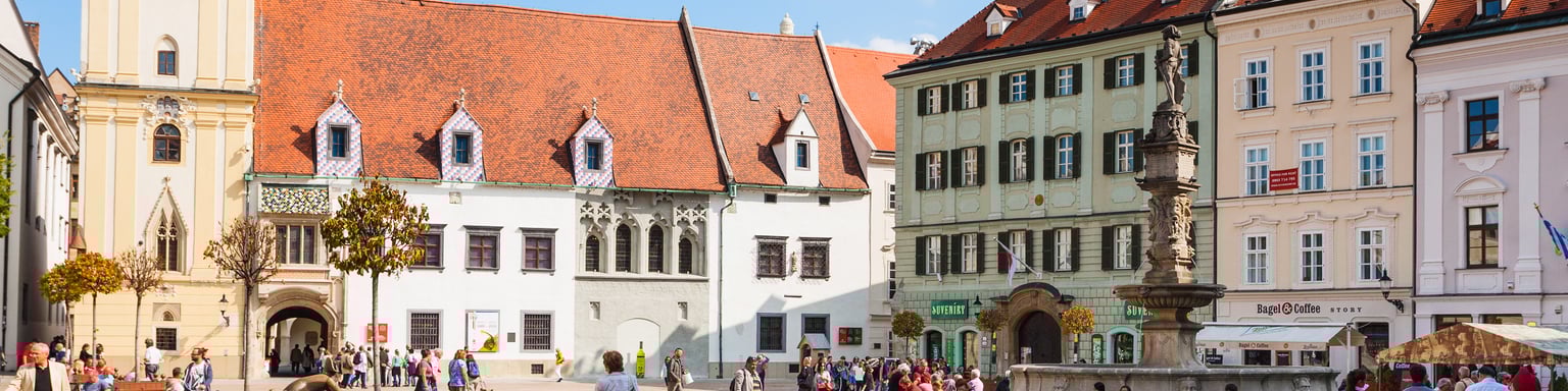 People milling around the Main Square in Bratislava, Slovakia