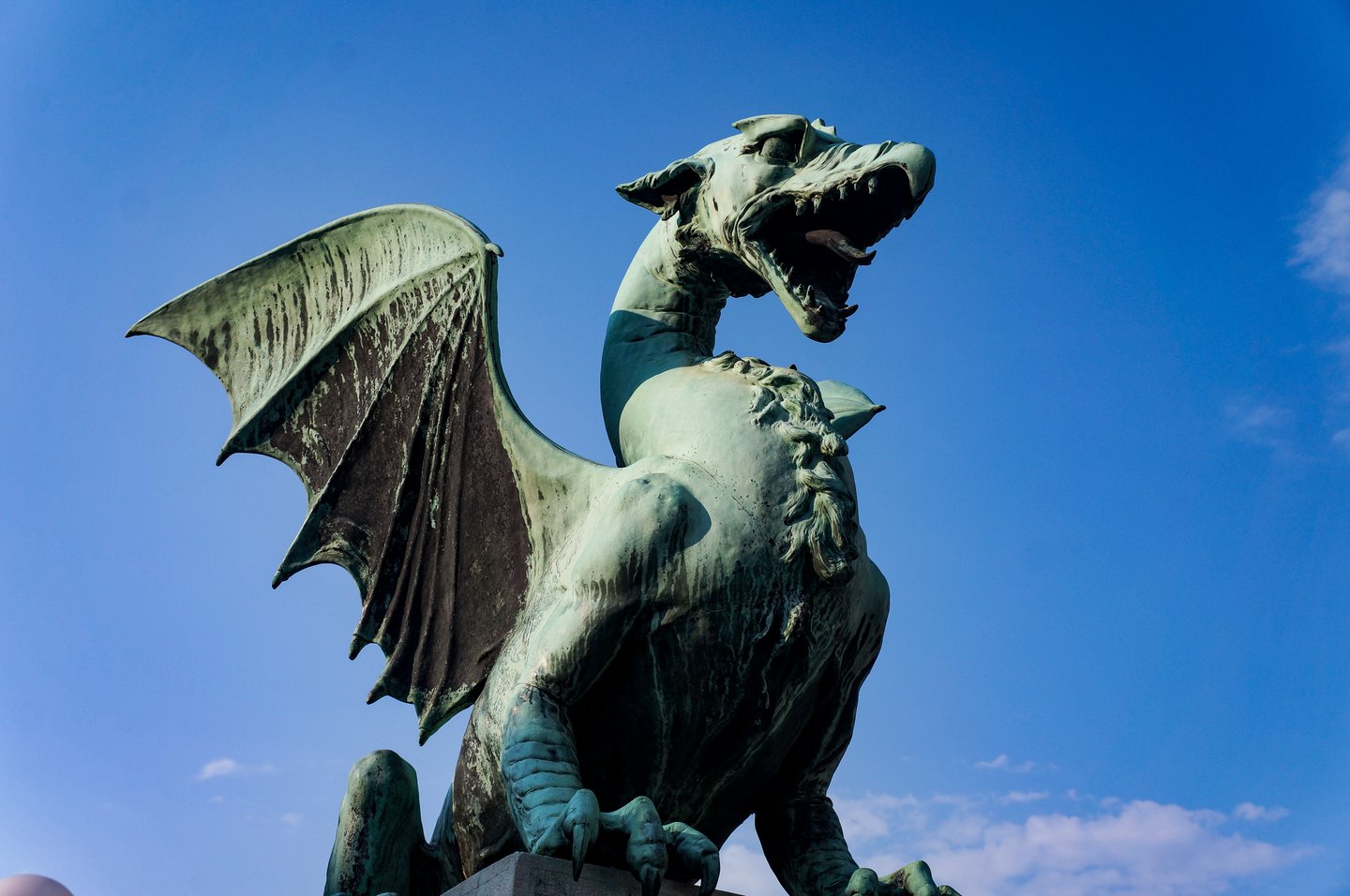 A close of of the dragon statue on Ljubljana's Dragon Bridge