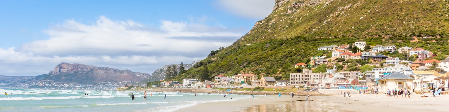 Sand and surf at Muizenberg Beach, Cape Town