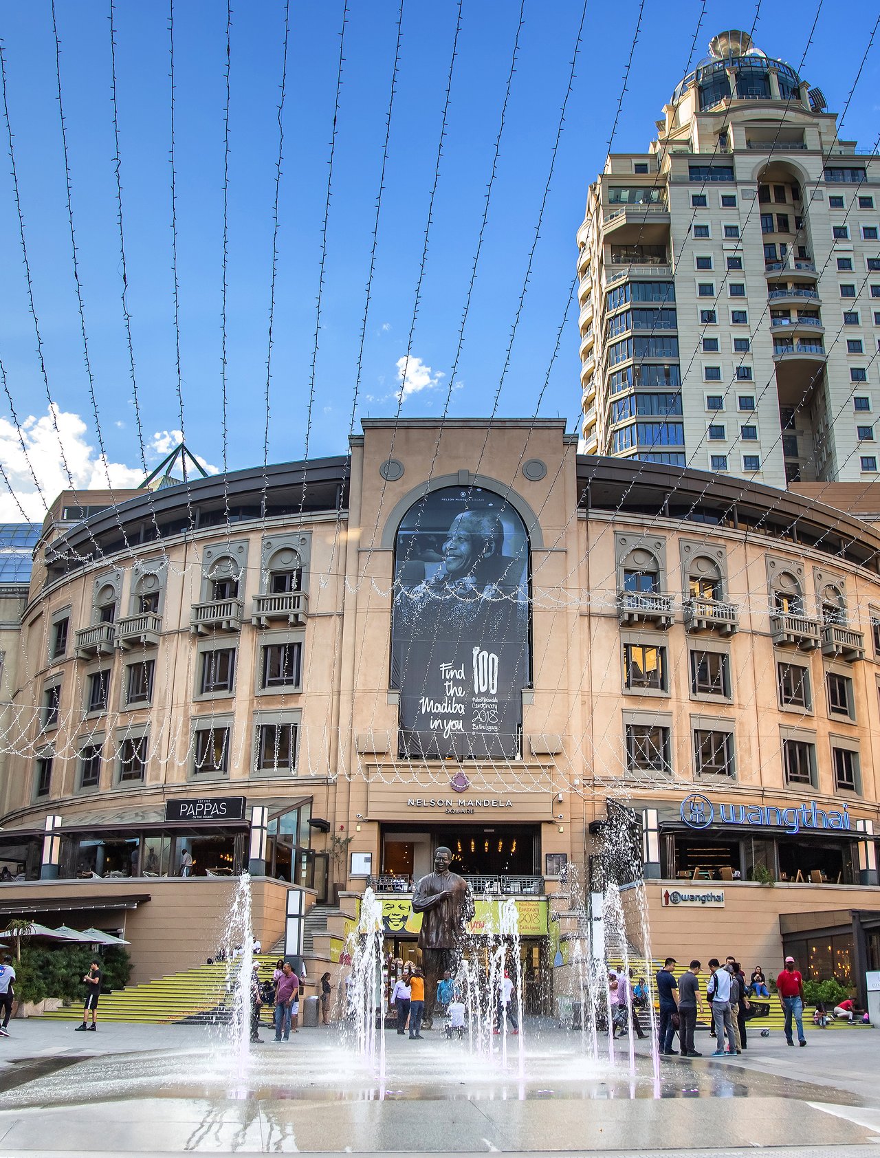 People in Nelson Mandela Square in Johannesburg