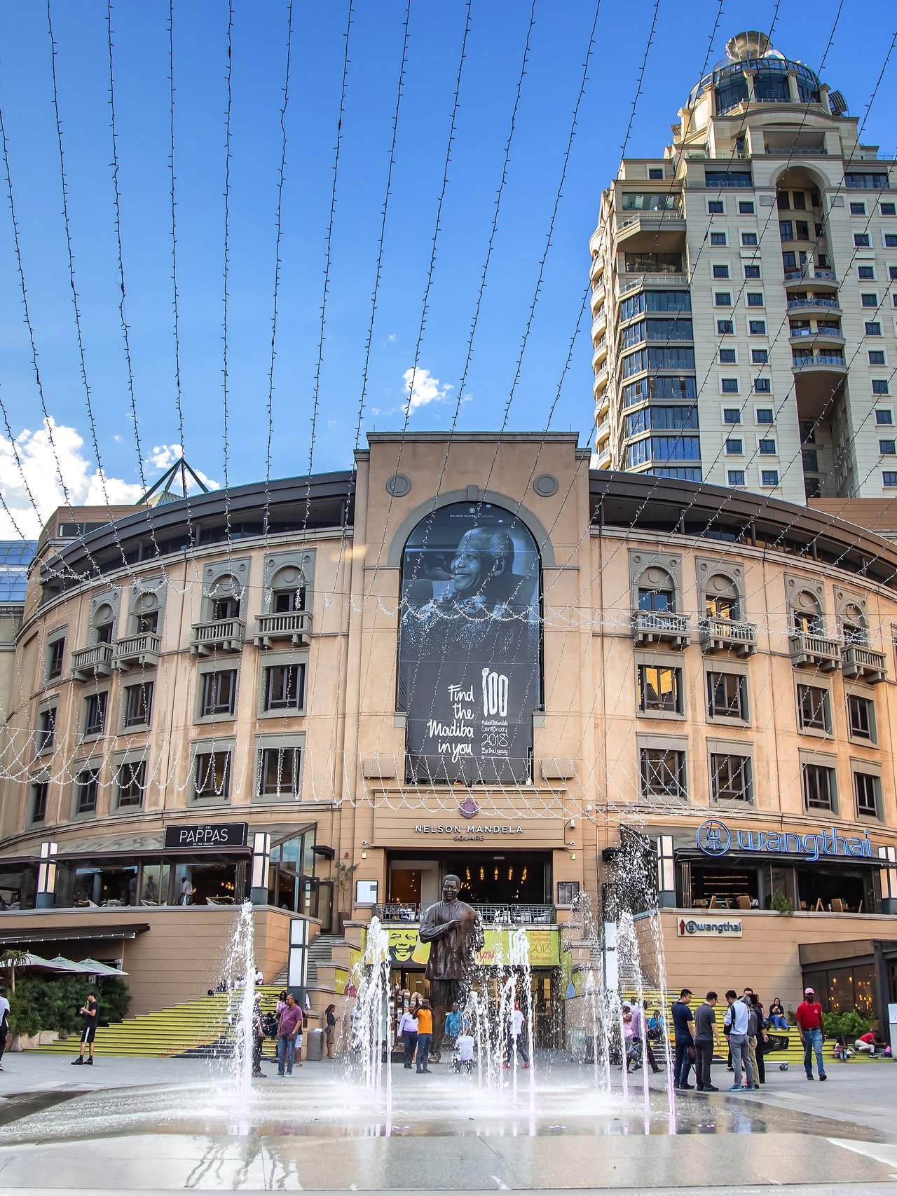 People in Nelson Mandela Square in Johannesburg