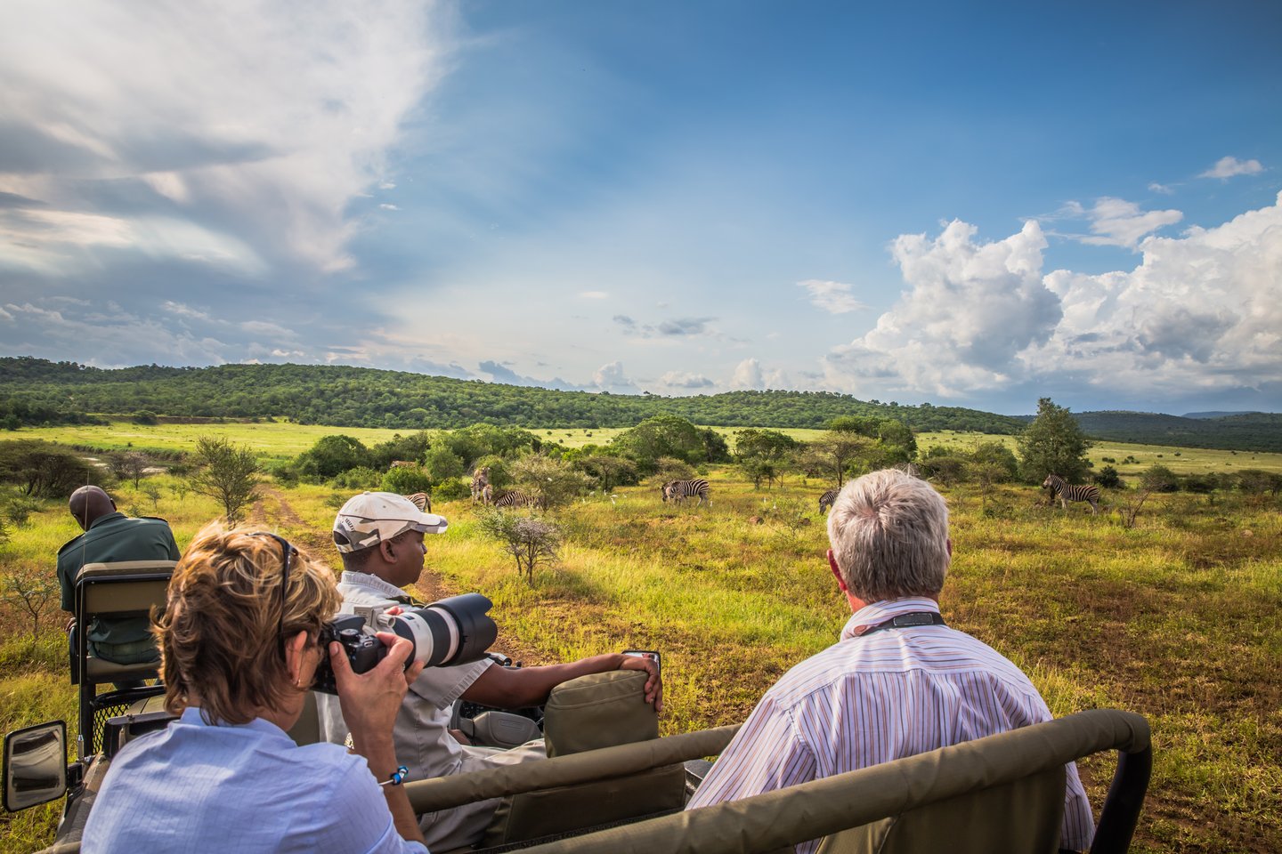 Taking photos on a game drive at Mkuze Falls Game Reserve, South Africa