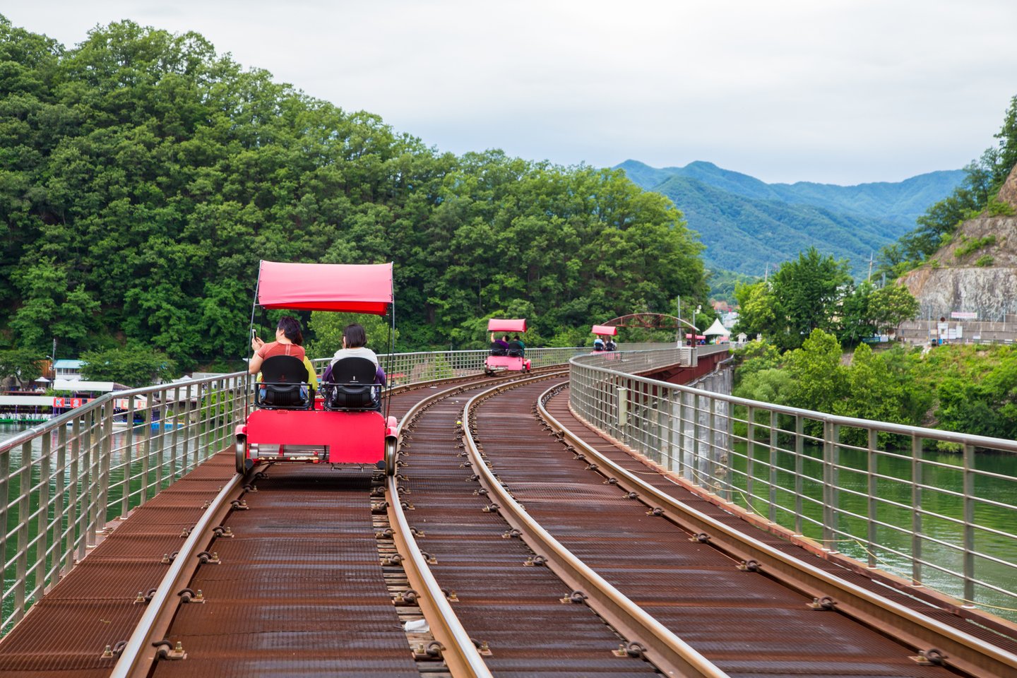Tourists pedalling along the tracks at Gangchon Rail Park in Chuncheon, South Korea.
