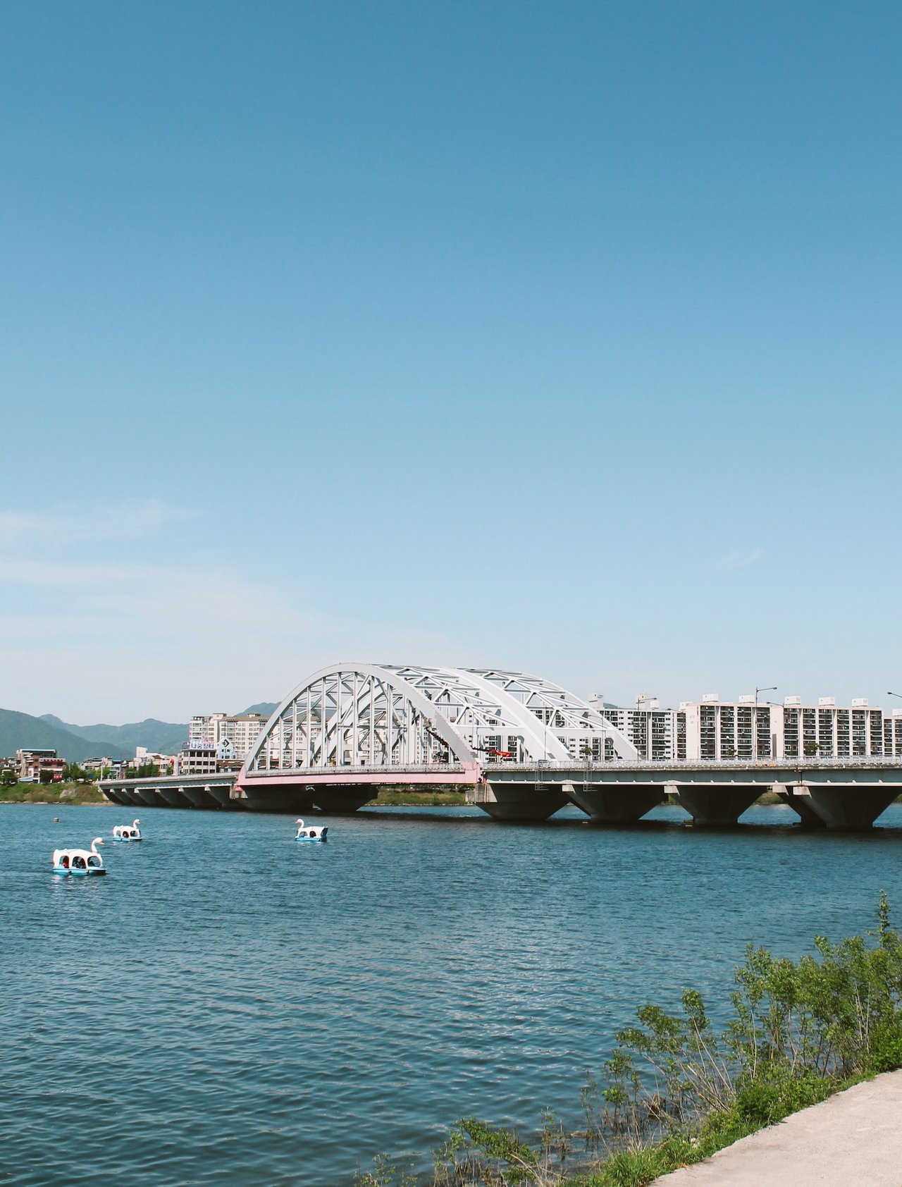 Looking at Chuncheon bridge and city from the riverside.
