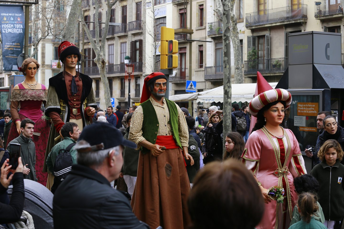 The parade of giant puppets during the Santa Eulalia festival
