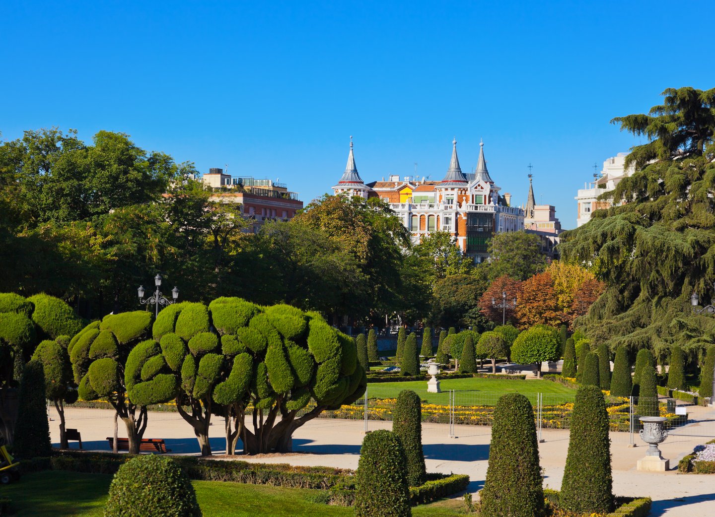 Green trees and quiet pathways in  El Retiro Park, Madrid
