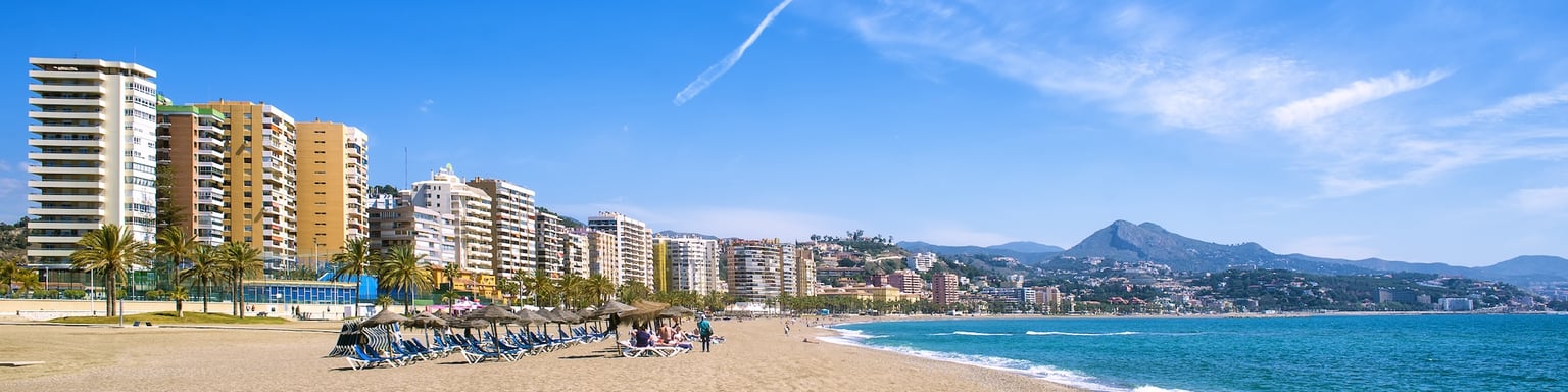 The white sands of Playa La Malagueta in Malaga, Spain