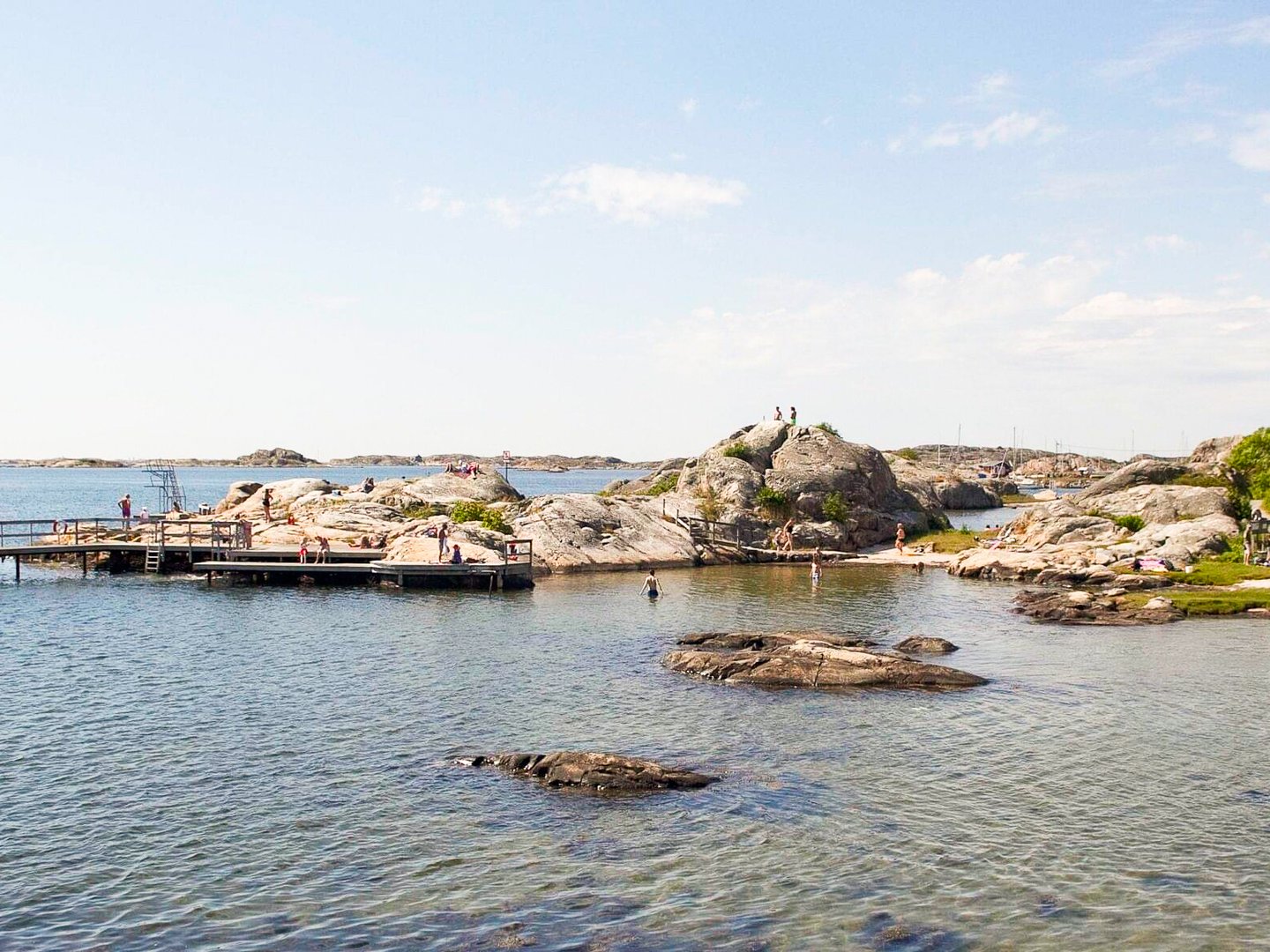 People swimming at Ramsdal Beach on Branno Island