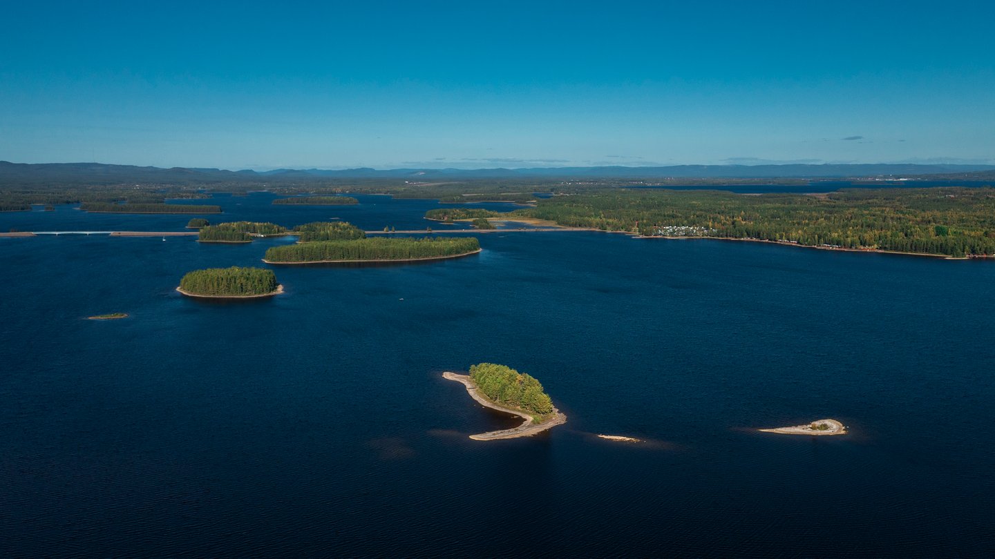 Islands on Lake Siljan with a clear sky above in Dalarna, Sweden
