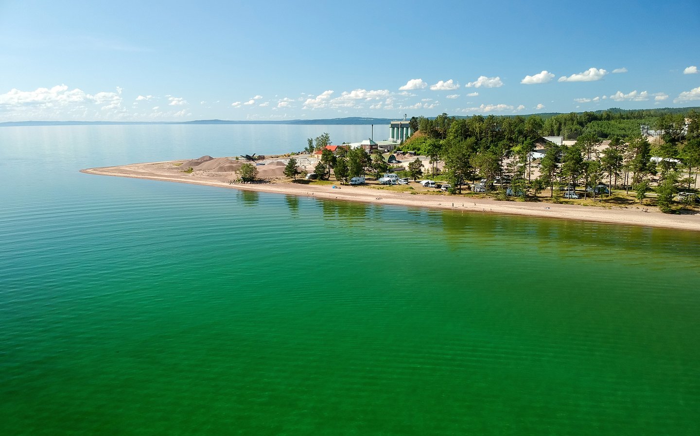 White beaches on Vattern Lake in summer
