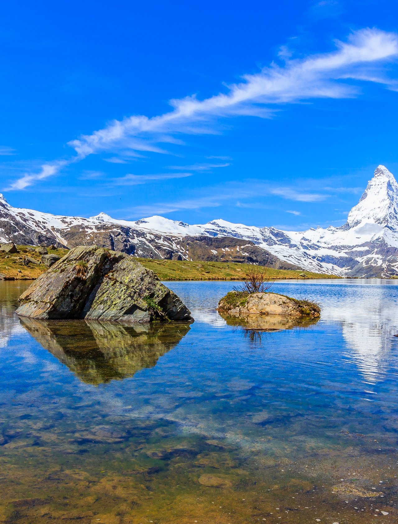 Reflections in Stellisee Lake near Zermatt, Switzerland