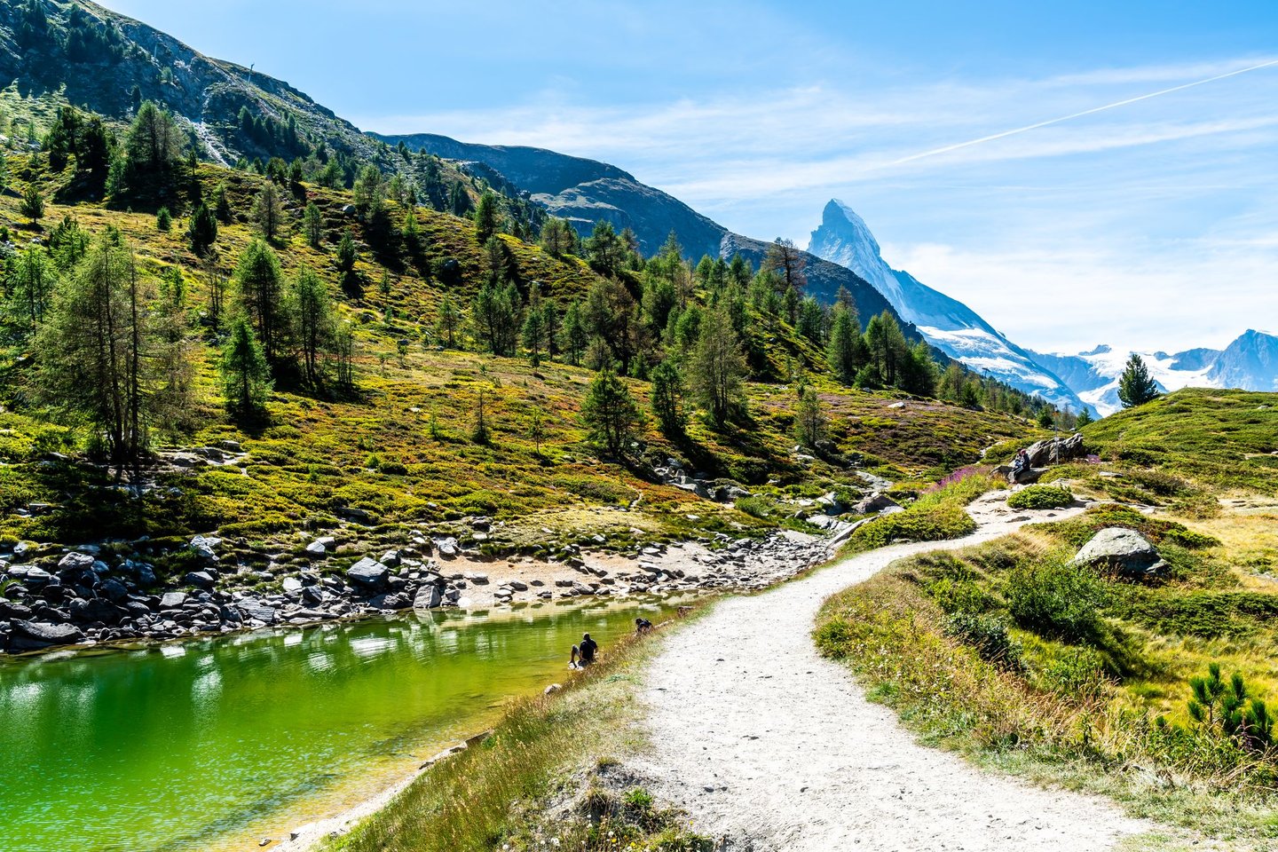 The trail passing Grunsee Lake near Zermatt, Switzerland