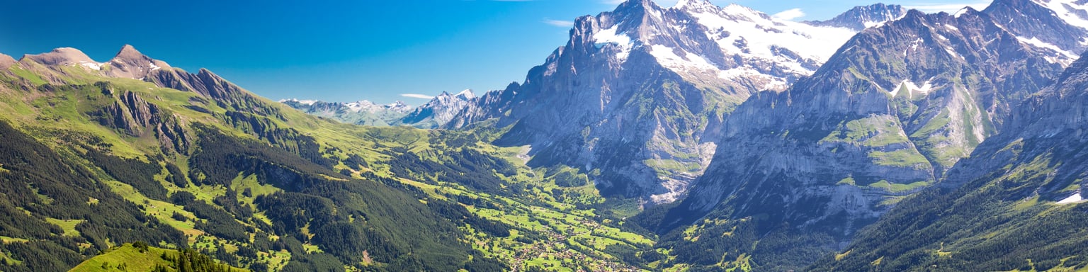The panoramic view of Grindelwald from Mannlichen in Switzerland on a sunny day