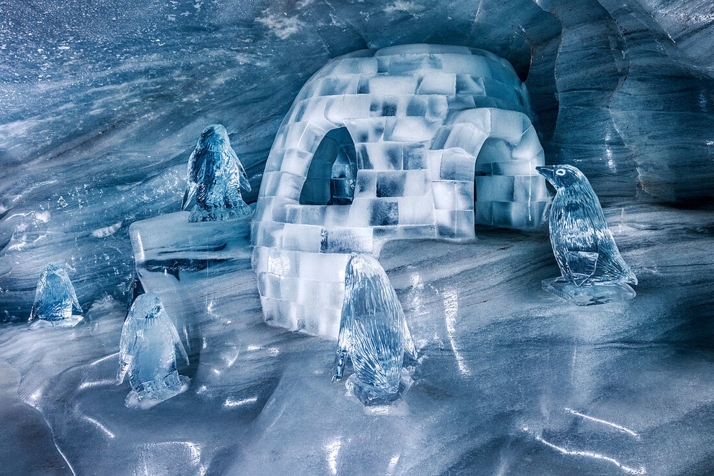 Ice penguins and an igloo at the Ice Palace in Jungfraujoch, Switzerland.