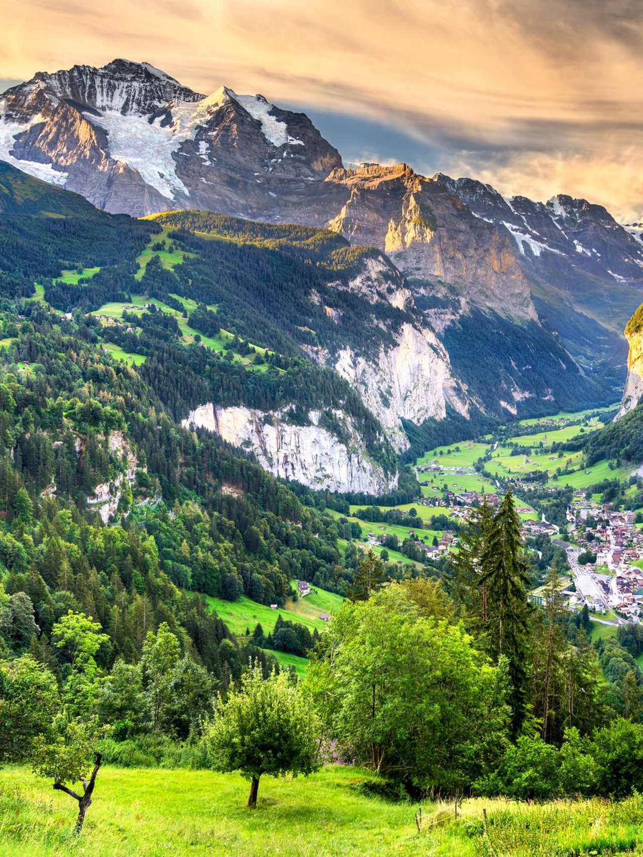 The green countryside of the Lauterbrunnen Valley in Switzerland